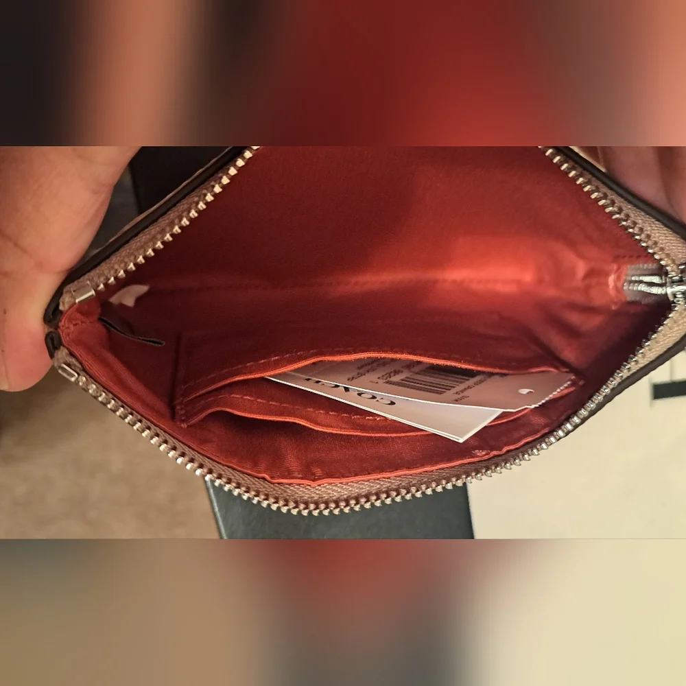Coach Beige and Red Wristlet with compact mirror and dust bag